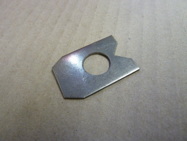 Main bearing lock tab rear